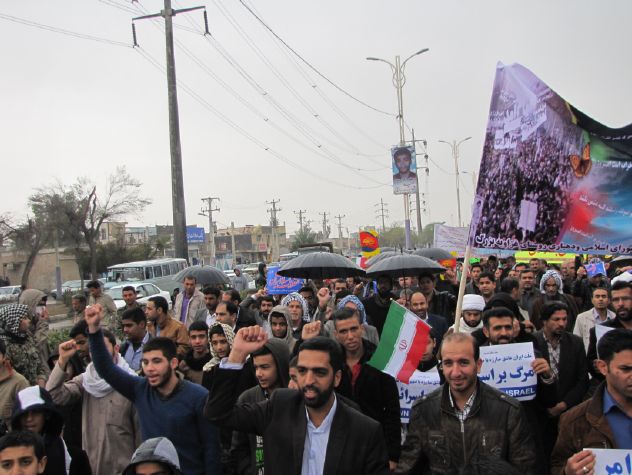 راهپیمایی باشکوه ۲۲ بهمن مردم شهرستان کارون زیر بارش باران