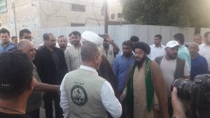 استقبال امام جمعه و مسئولین از ورودکاروان کمک های حشدالشعبی عراق به شهرستان کارون