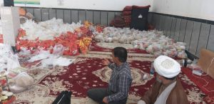 امام جمعه کارون از محل بسته بندی و توزیع خشبار به سیلزده گان بازدید کردند