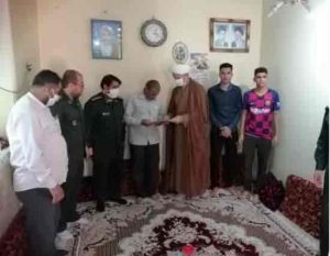 دیدار امام جمعه ومسئولین شهرستان کارون با آزاده سرافراز دفاع مقدس